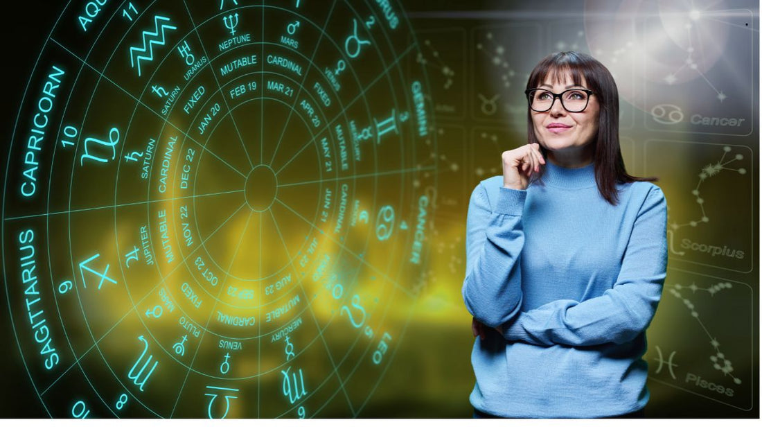 Femme observant son horoscope devant une roue astrologique lumineuse avec les signes du zodiaque, à l'occasion de la nouvelle lune en Cancer du 24 juillet 2025